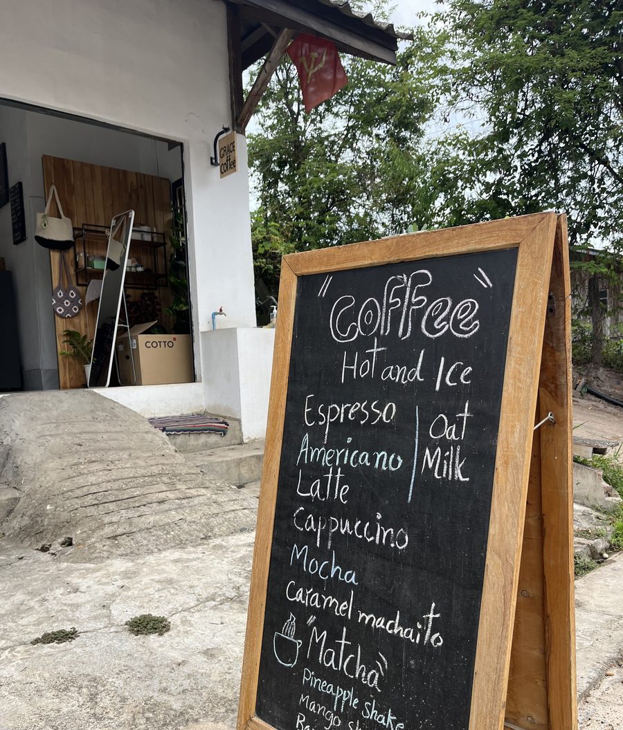 Chalkboard menu outside Pha Khoun Coffee